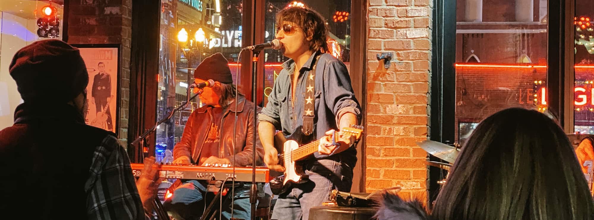 bar singer on guitar in Dayton